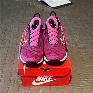 Nike Women’s Pink and Yellow Mesh Sneakers